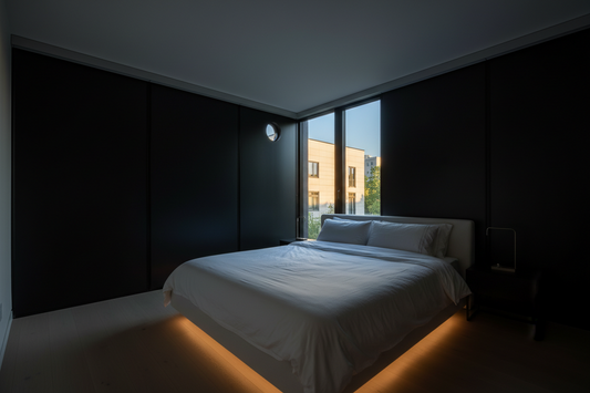Modern American bedroom with blackout window film creating complete darkness for optimal sleep, featuring minimalist design and peaceful sleeping environment