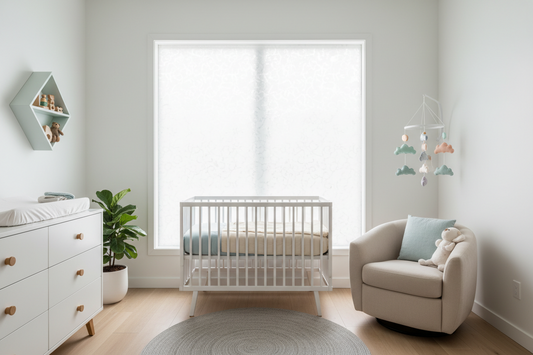 Modern nursery room with frosted window film providing natural light and privacy, featuring white crib and calming decor for baby safety